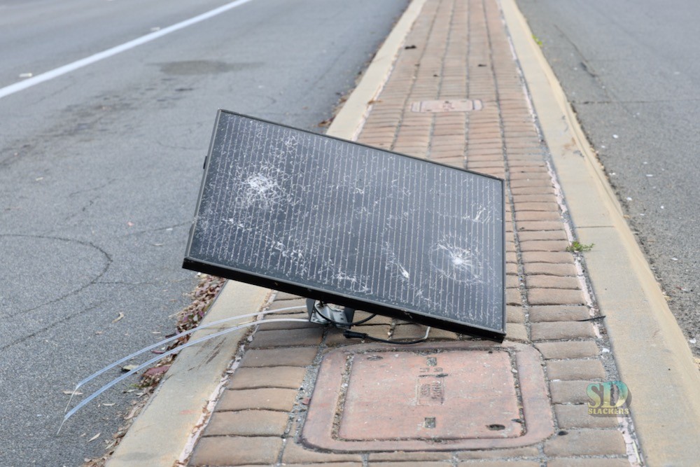 a flock camera solar panel sits in the median